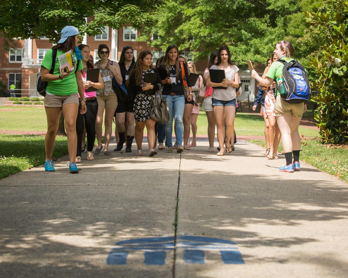 Group touring campus with peer mentors for orientation