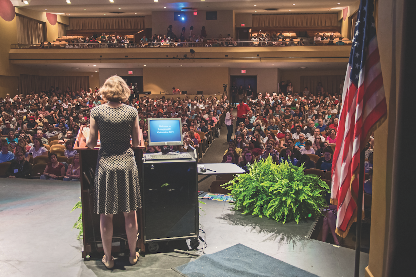 Woman at podium