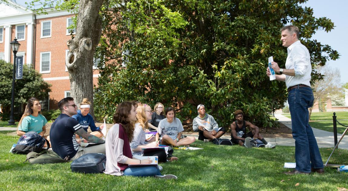 Outdoor class with Wade Edwards behind Lancaster