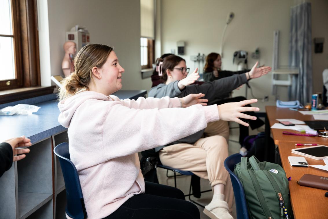 Nursing students participating in Experiential Dementia Skills Training