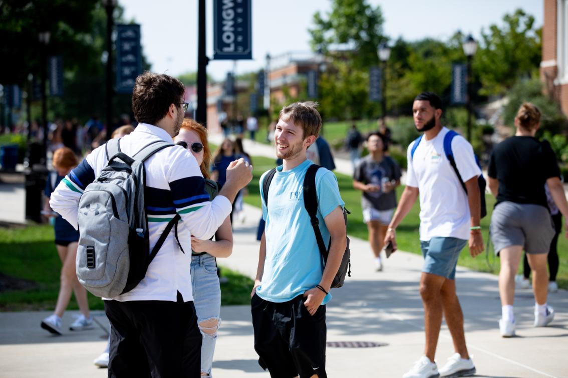 Students chatting on Brock Commons